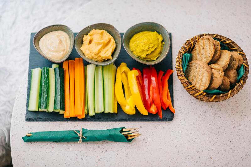 Carrot and cucumber sticks with hummus dip